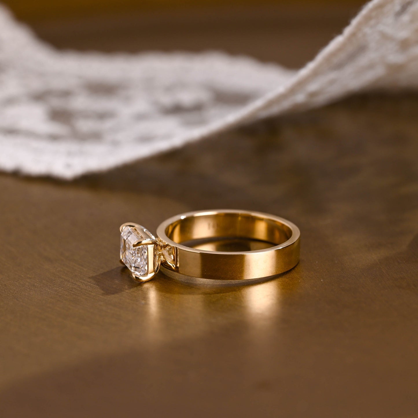 SquareJewelry emerald cut moissanite engagement ring East-West Wide Band Emerald Cut Moissanite Engagement Ring