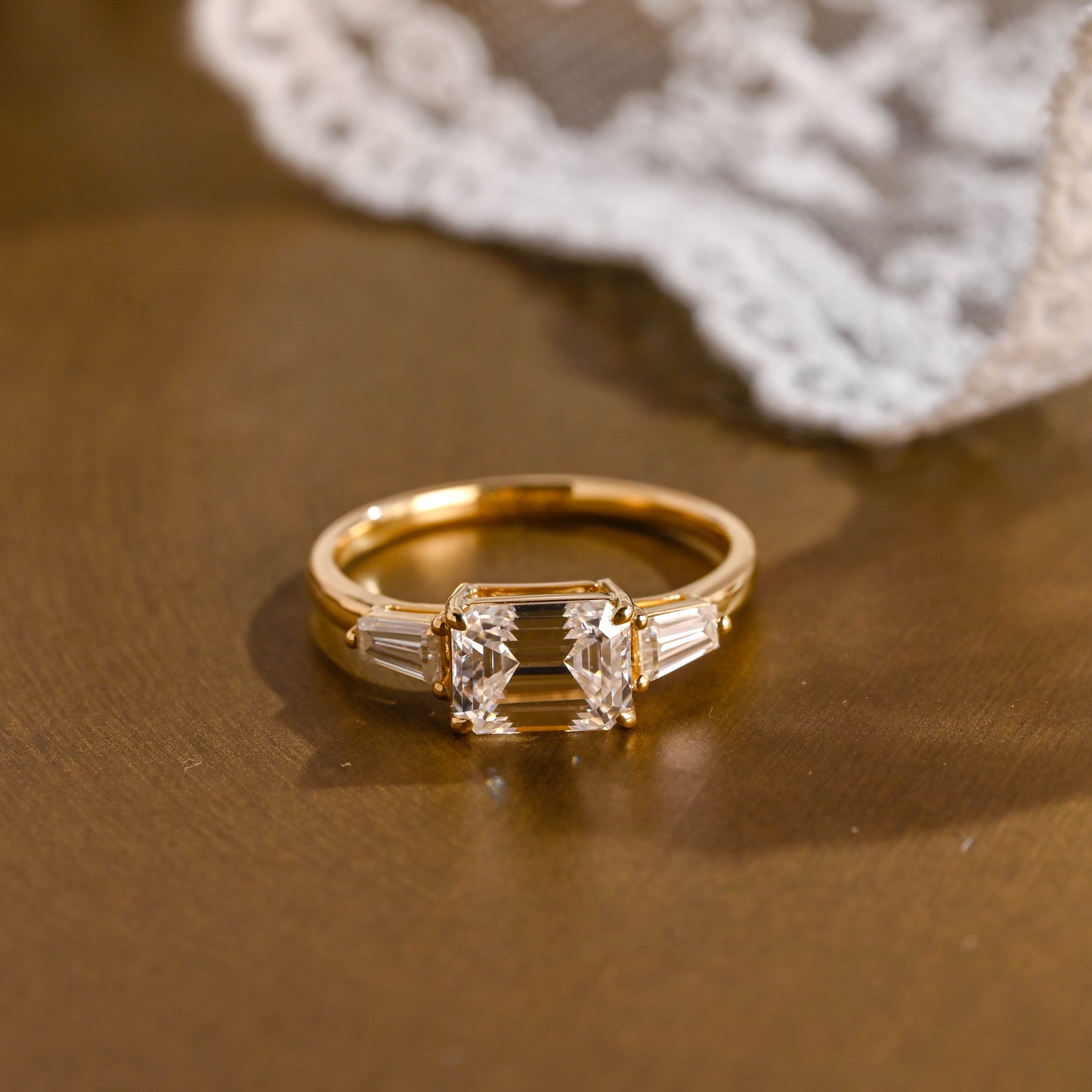 SquareJewelry emerald cut moissanite engagement ring Solid Gold East-West Tapered Baguette Three Stone Emerald Cut Moissanite Engagement Ring