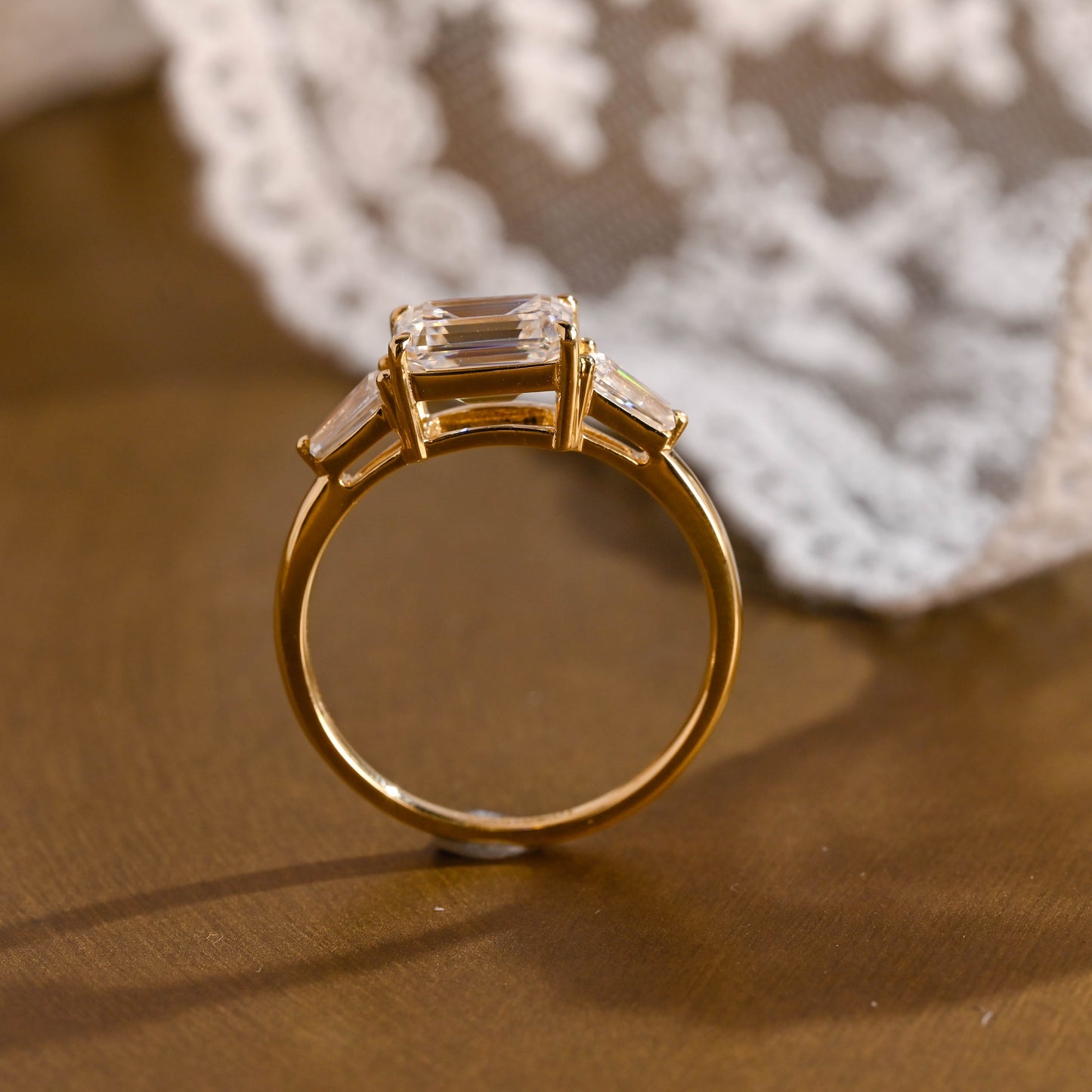 SquareJewelry emerald cut moissanite engagement ring Solid Gold East-West Tapered Baguette Three Stone Emerald Cut Moissanite Engagement Ring