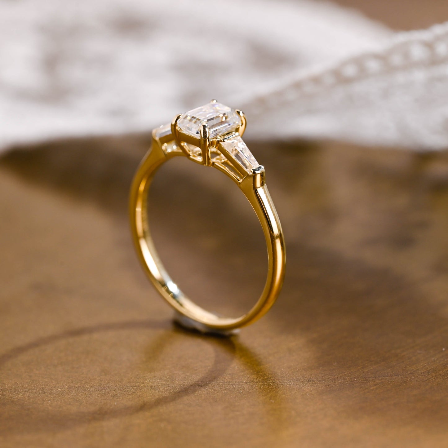 SquareJewelry emerald cut moissanite engagement ring Three Stone Rapezoid Accent Emerald Cut Moissanite Engagement Ring