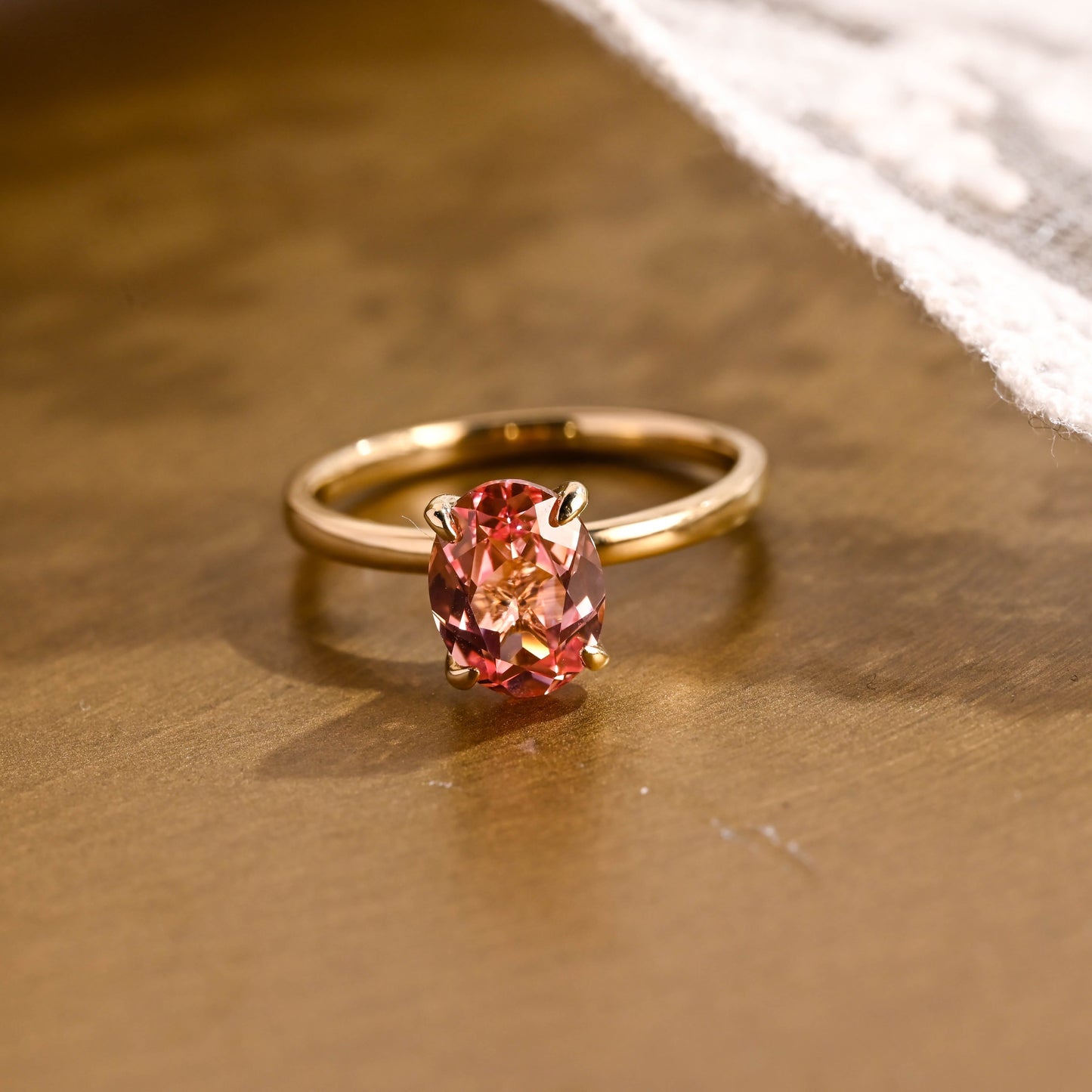 SquareJewelry oval cut lab grown sapphire engagement ring Tulip Oval Cut Lab Grown Pink Sapphire Engagement Ring