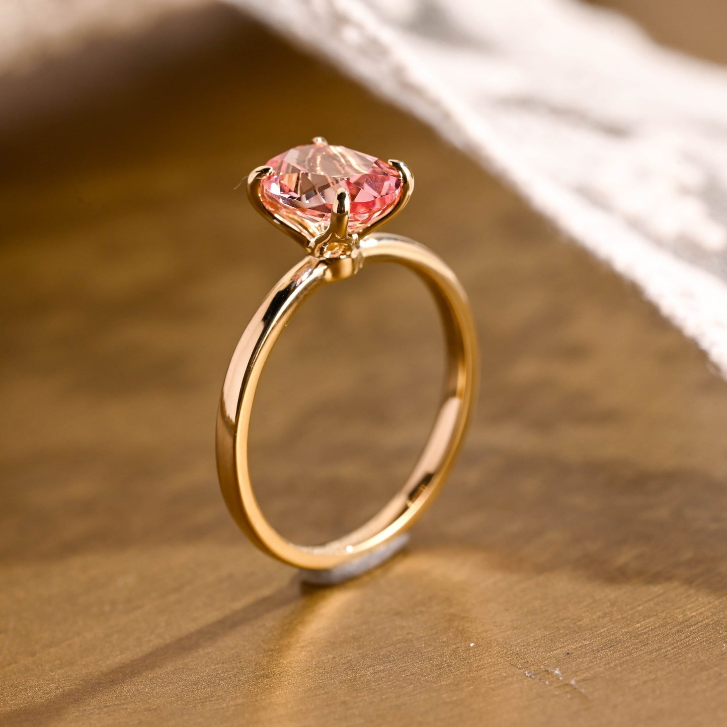 SquareJewelry oval cut lab grown sapphire engagement ring Tulip Oval Cut Lab Grown Pink Sapphire Engagement Ring