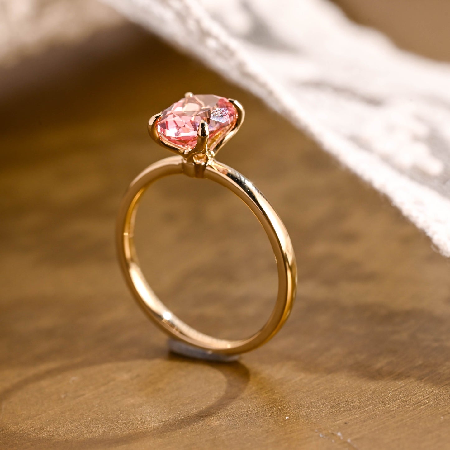 SquareJewelry oval cut lab grown sapphire engagement ring Tulip Oval Cut Lab Grown Pink Sapphire Engagement Ring