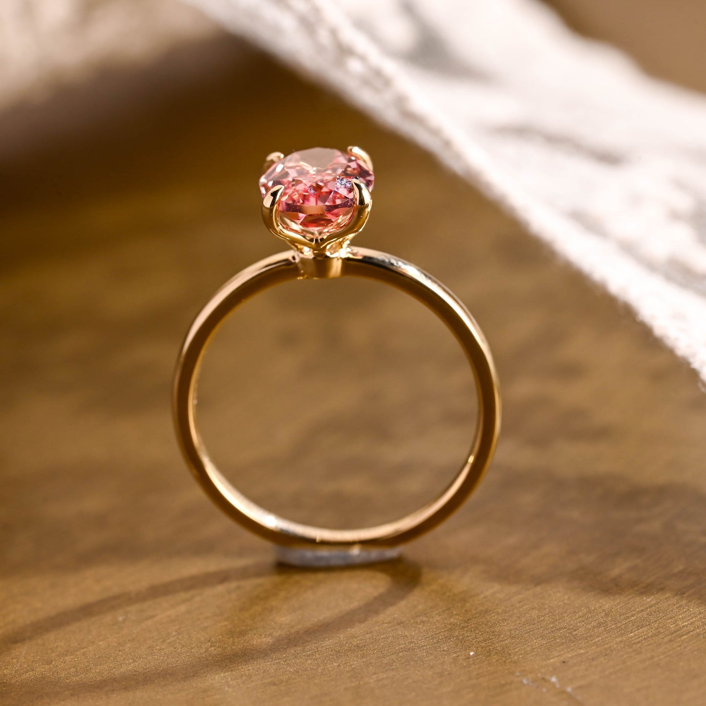 SquareJewelry oval cut lab grown sapphire engagement ring Tulip Oval Cut Lab Grown Pink Sapphire Engagement Ring
