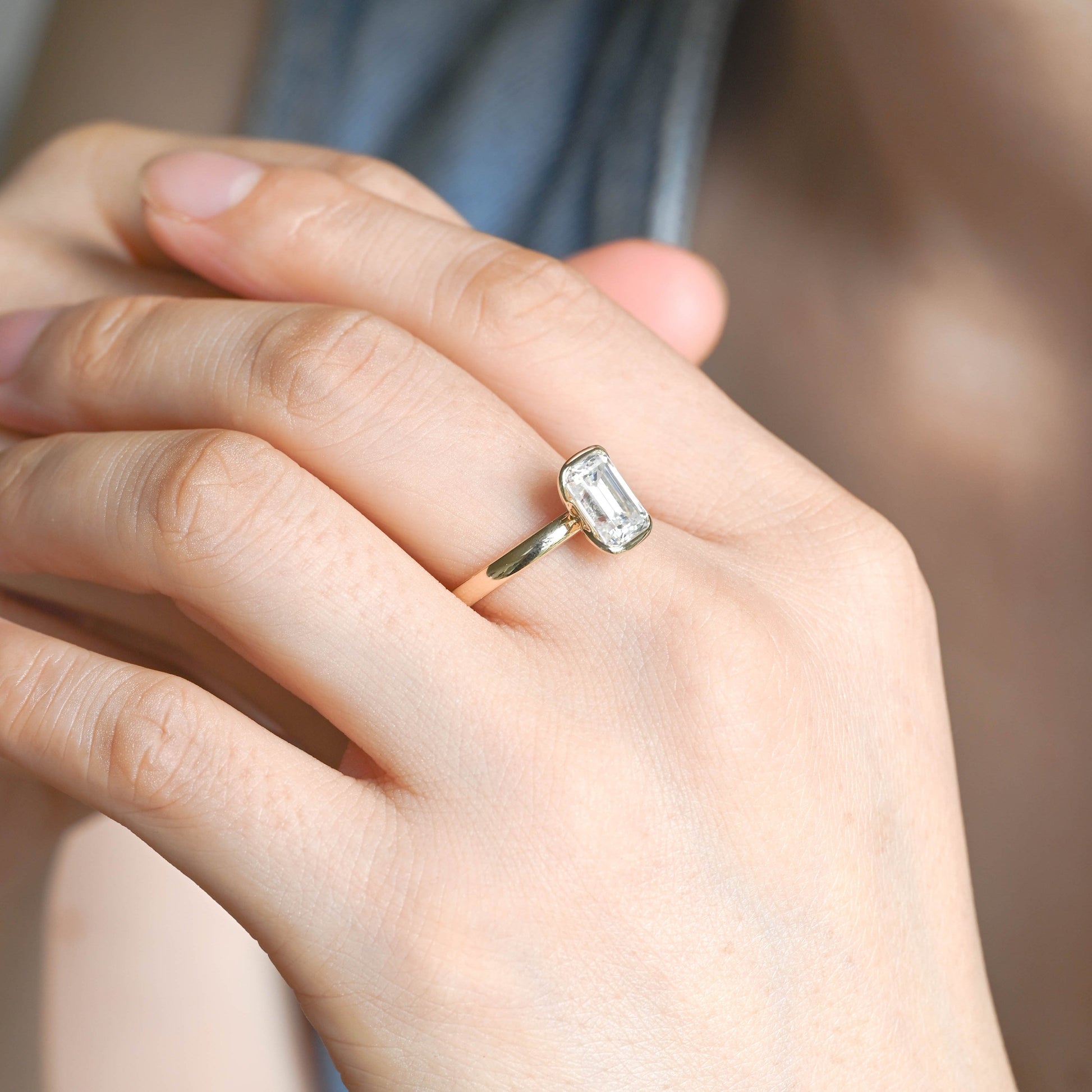 SquareJewelry emerald cut moissanite engagement ring Solid Gold 2.5mm Width Half Bezel Emerald Cut Moissanite Engagement Ring