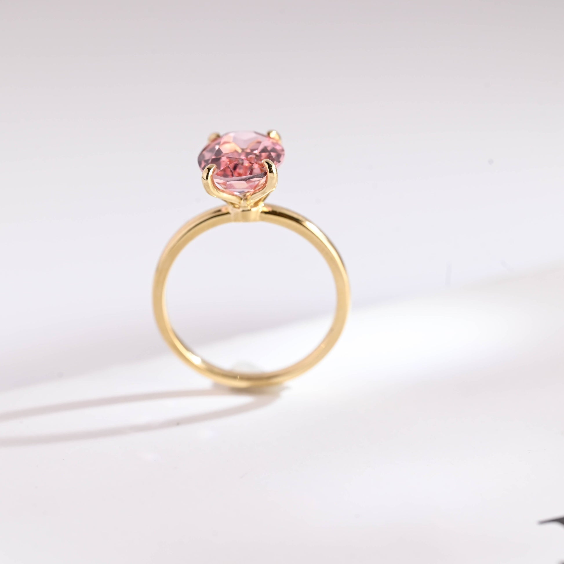 SquareJewelry oval cut lab grown sapphire engagement ring Tulip Oval Cut Lab Grown Pink Sapphire Engagement Ring