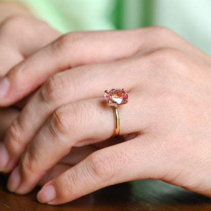 SquareJewelry oval cut lab grown sapphire engagement ring Tulip Oval Cut Lab Grown Pink Sapphire Engagement Ring